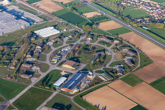Concrete shelters and former airfield hangars with arch cover in today's commercial area in Lahr / Black Forest in the state Baden-Wuerttemberg, Germany
