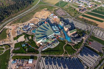 Oblique view of Extension construction site for the Water park "Rulantica" and museum hotel Kronasar on the grounds of the locked down amusement park "Europapark" in Rust in the state of Baden-Wuerttemberg, Germany