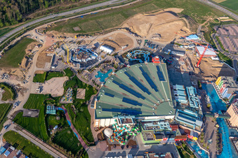 Extension construction site for the Water park "Rulantica" and museum hotel Kronasar on the grounds of the locked down amusement park "Europapark" in Rust in the state of Baden-Wuerttemberg, Germany from above