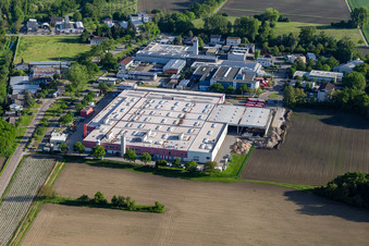 Building and production halls on the premises of Coca-Cola European Partners Deutschland GmbH in Neureut in the state Baden-Wuerttemberg, Germany from above
