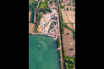 Oblique view of HBM Hagenbacher Bau Mineralstoffe quarry lake in Hagenbach in the state Rhineland-Palatinate, Germany