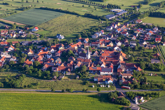 Aerial view of Village view on the edge of agricultural fields and land in Loeffelsterz in the state Bavaria, Germany