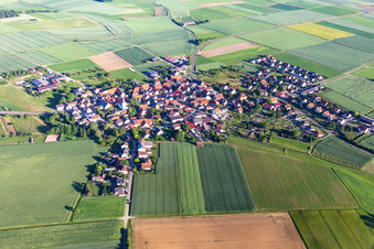 Village - view on the edge of agricultural fields and farmland in Ebertshausen in the state Bavaria from above