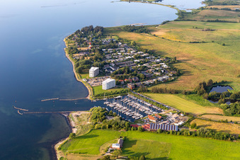 Pleasure boat marina of CLUB NAUTIC e.V. with docks and moorings on the shore area of the Foerde with Restaurant "Leuchtturm" in Schausende in Gluecksburg in the state Schleswig-Holstein, Germany