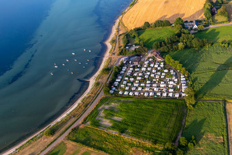 Campsite Habernis with caravans and tents on the shore of Baltic Sea in Steinberg in the state Schleswig-Holstein, Germany
