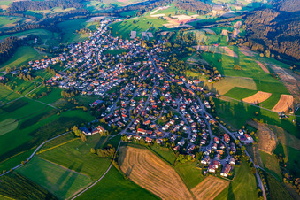 Aerial view of Village view on the edge of agricultural fields and land in Dietersweiler in the state Baden-Wuerttemberg, Germany