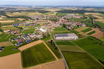 Aerial view of Building and production halls on the premises of Beurer GmbH in Uttenweiler in the state Baden-Wuerttemberg, Germany