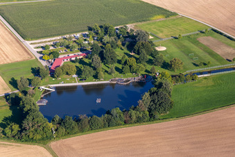 Beach areas on the - Naturfreibad in Uttenweiler in the state Baden-Wuerttemberg, Germany