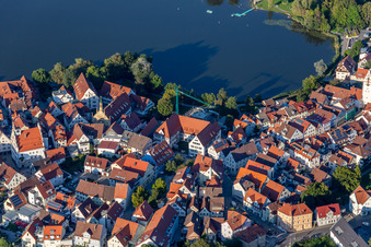 City view of the downtown area on the shore areas of Stadt See in Bad Waldsee in the state Baden-Wuerttemberg, Germany from above