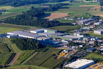 Buildings and production halls on the vehicle construction site of Hymer Reisemobile GmbH in Bad Waldsee in the state Baden-Wuerttemberg, Germany from the plane