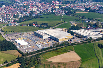 Building and production halls on the premises of Liebherr-Mischtechnik GmbH in Bad Schussenried in the state Baden-Wuerttemberg, Germany from the plane