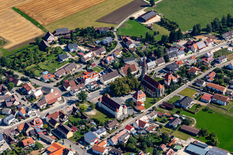 Town View of the streets and houses of the residential areas with with Town hall and Church St. Konrad in Langenenslingen in the state Baden-Wuerttemberg, Germany