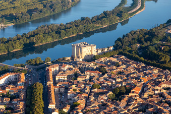 Aerial view of City view on the river bank of the river Rhone with castle Chateau de Tarascon in Tarascon in Provence-Alpes-Cote d'Azur, France