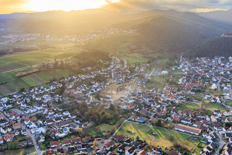 Aerial view of View of the town from the northeast with the collegiate church in the evening light in Klingenmünster in the state Rhineland-Palatinate, Germany