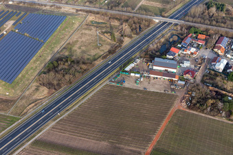 Oblique view of In der Nauroth commercial area in Ellerstadt in the state Rhineland-Palatinate, Germany