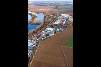 Industrial road with industrial area at Silbersee in the district Roxheim in Bobenheim-Roxheim in the state Rhineland-Palatinate, Germany