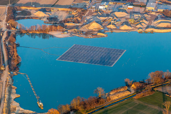 Oblique view of Floating photovoltaic island on the quarry lake in Leimersheim in the state Rhineland-Palatinate, Germany