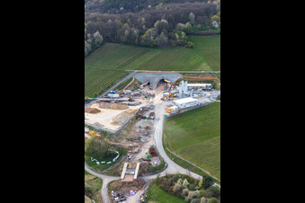 Construction site of the eastern tunnel portal for the Astrid Tunnel for the underpass and bypass of Bad Bergzabern between B38 (Weinstraße) and B427 (Kurtalstraße) in Dörrenbach in the state Rhineland-Palatinate, Germany seen from above