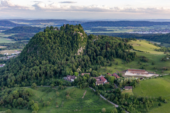 Aerial view of Hohentwiel with fortress ruins from 914 and panoramic views is an extinct volcano in Singen in the state Baden-Wuerttemberg, Germany