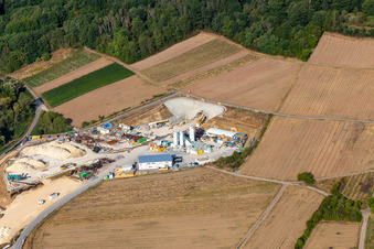 Construction site of the eastern tunnel portal for the Astrid Tunnel for the underpass and bypass of Bad Bergzabern between B38 (Weinstraße) and B427 (Kurtalstraße) in Dörrenbach in the state Rhineland-Palatinate, Germany from the drone perspective