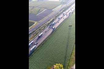 Aerial view of Autostrada del Sole next to the high-speed rail line in San Martino in Rio in the state Reggio Emilia, Italy