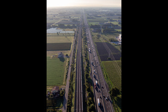 Aerial photograpy of Autostrada del Sole next to the high-speed rail line in San Martino in Rio in the state Reggio Emilia, Italy