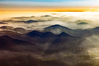 The 3 castles: Münz, Anebos and Trifels in the haze from the north in Annweiler am Trifels in the state Rhineland-Palatinate, Germany
