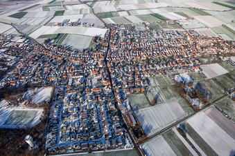 Kirchstraße in winter with snow in Hatzenbühl in the state Rhineland-Palatinate, Germany