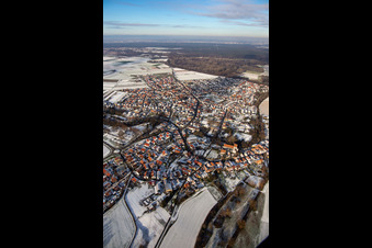 Aerial view of Bellheimer Straße in winter with snow in Hördt in the state Rhineland-Palatinate, Germany