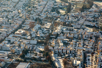 Braun Foundation and St. Mauritius Church in winter with snow in Rülzheim in the state Rhineland-Palatinate, Germany