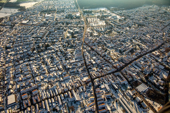 Kuhhardter and Rheinzaberner Straße in winter with snow in Rülzheim in the state Rhineland-Palatinate, Germany