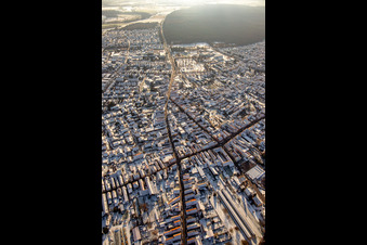 Rheinzaberner and Kuhhardter Straße in winter with snow in Rülzheim in the state Rhineland-Palatinate, Germany