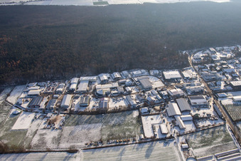 Am Gäxwald industrial estate in winter with snow in Herxheim bei Landau in the state Rhineland-Palatinate, Germany