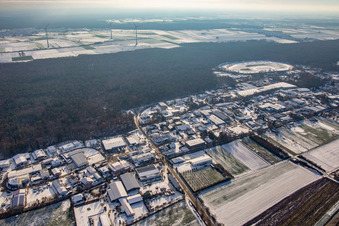Aerial view of Am Gäxwald industrial estate in winter with snow in Herxheim bei Landau in the state Rhineland-Palatinate, Germany