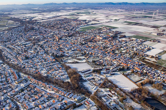 Aerial view of Alter Klingbach and Klingbach-Tankgraben in winter with snow in Herxheim bei Landau in the state Rhineland-Palatinate, Germany