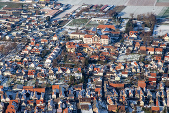 St. Paulus-Stift in winter with snow in Herxheim bei Landau in the state Rhineland-Palatinate, Germany