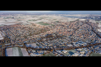 City panorama in winter with snow in Herxheim bei Landau in the state Rhineland-Palatinate, Germany