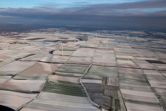 Aerial view of Wind farm in winter with snow in Offenbach an der Queich in the state Rhineland-Palatinate, Germany