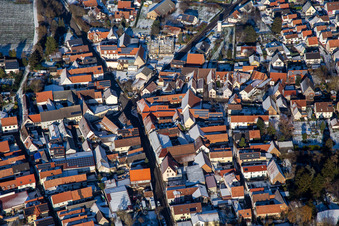 LandauerStraße /Bahnhofstraße in winter with snow in Insheim in the state Rhineland-Palatinate, Germany