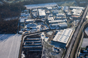 Grosse Ahlmühle industrial estate in winter with snow in Rohrbach in the state Rhineland-Palatinate, Germany
