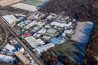Aerial view of Grosse Ahlmühle industrial estate in winter with snow in Rohrbach in the state Rhineland-Palatinate, Germany