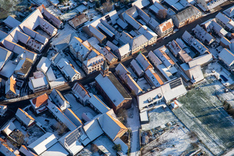 Protestant church in winter with snow in Steinweiler in the state Rhineland-Palatinate, Germany