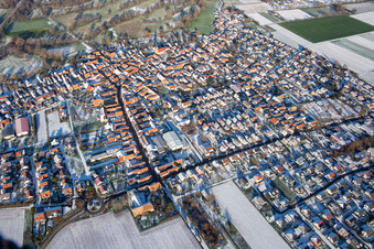Aerial view of Main street in winter with snow in Steinweiler in the state Rhineland-Palatinate, Germany