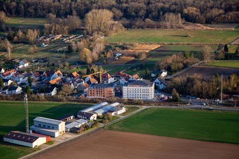 New construction of age-appropriate apartments at the railway crossing in the district Schaidt in Wörth am Rhein in the state Rhineland-Palatinate, Germany from above