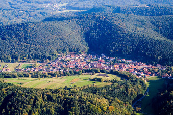 Village - view on the edge of agricultural fields and farmland in Vorderweidenthal in the state Rhineland-Palatinate, Germany
