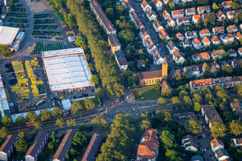 John Deere next to St. Mark's Church in the district Almenhof in Mannheim in the state Baden-Wuerttemberg, Germany