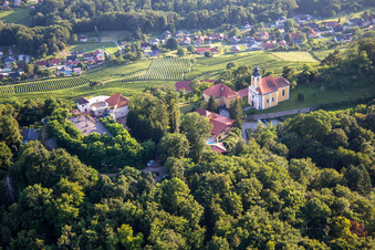 Aerial photograpy of Church of Župnijska cerkev sv. Marije Vnebovzete and Café Huda Liza on the Vurberg in Duplek in the state Slovenia, Slovenia