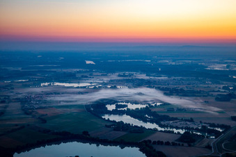 Upper Old Rhine in the morning mist before sunrise in Neupotz in the state Rhineland-Palatinate, Germany