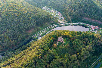 Oblique view of Neudahn Castle ruins above the Neudahner Weiher campsite in Dahn in the state Rhineland-Palatinate, Germany