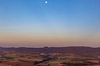 Moon over Oberotterbach in Oberotterbach in the state Rhineland-Palatinate, Germany